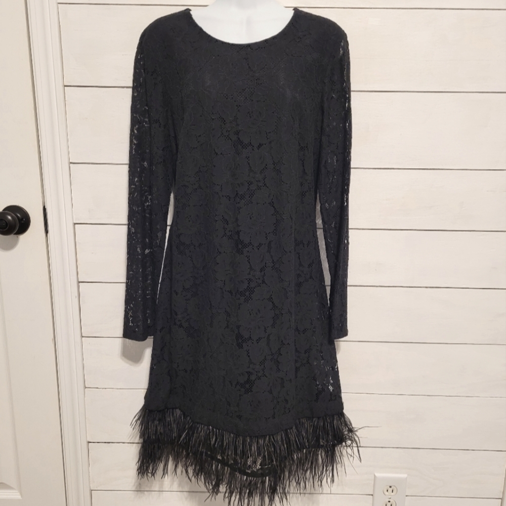 DKNY lace black dress with feather trim. Size 10 misses.